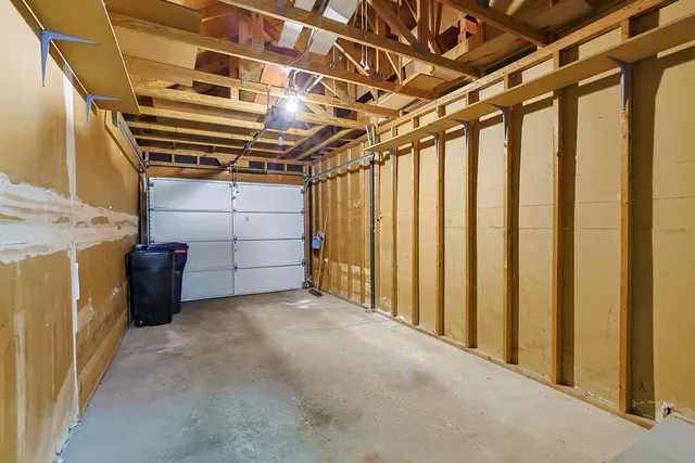 a view of a utility room with stairs