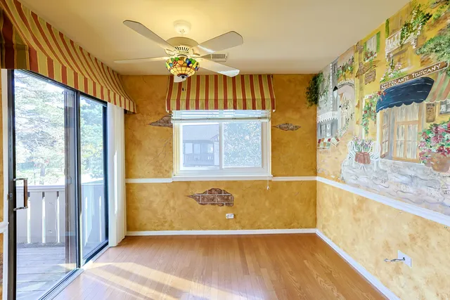 a view of a hallway with a chandelier