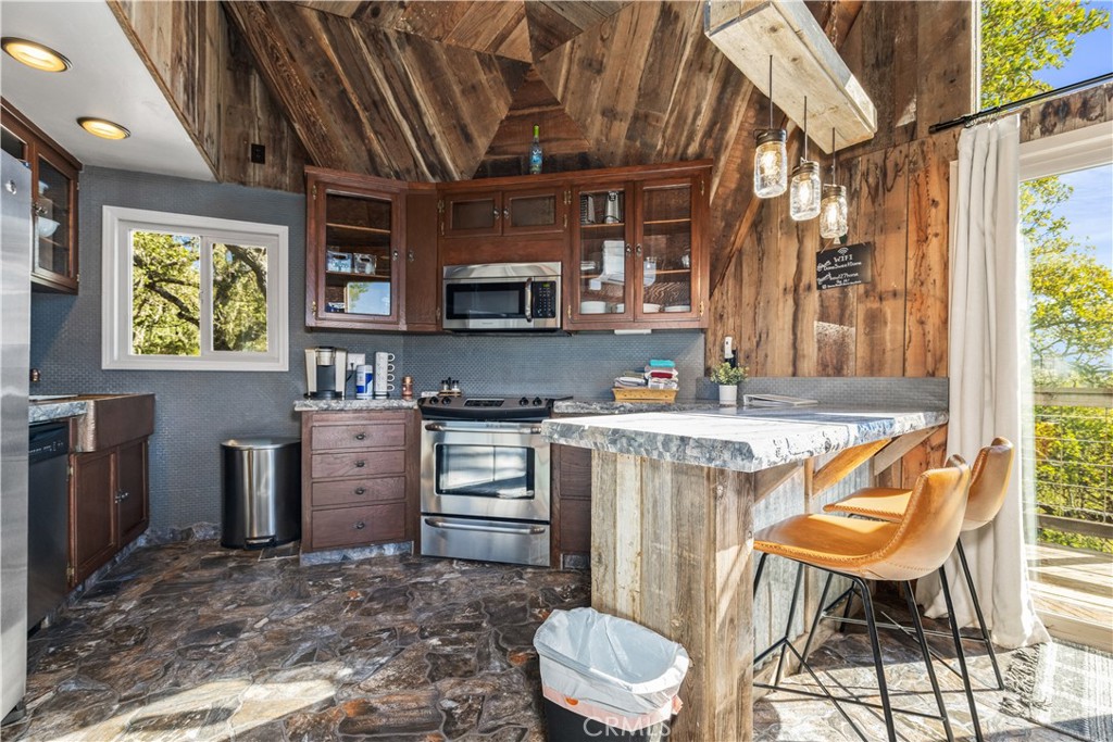 2178 Ridge Rider Road Bradley, CA 93426 - Photo 12 of 51 a kitchen with a sink appliances and cabinets