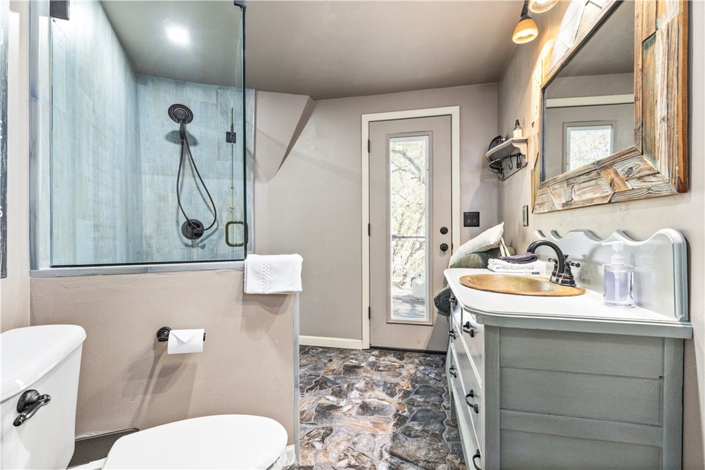 2178 Ridge Rider Road Bradley, CA 93426 - Photo 20 of 51 a bathroom with a granite countertop sink toilet and shower