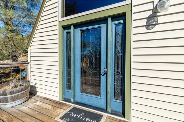 a view of a house with a door and a window