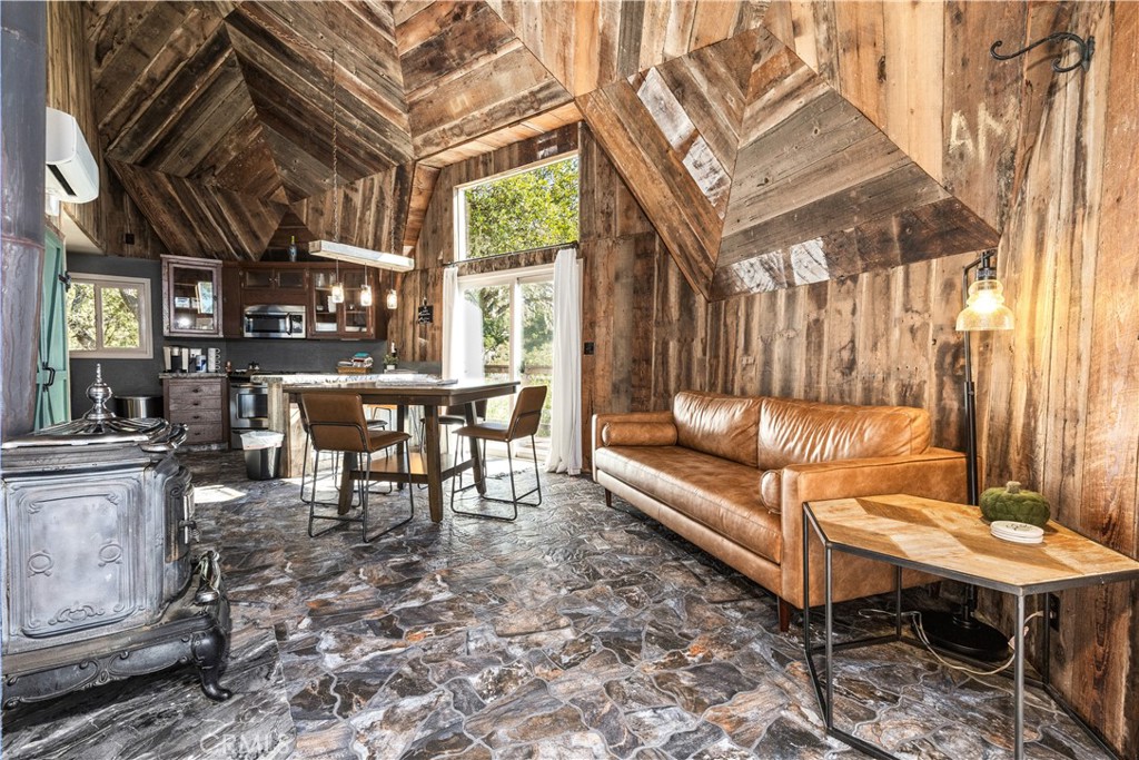2178 Ridge Rider Road Bradley, CA 93426 - Photo 8 of 51 a view of a chairs and a table in the back yard of the house