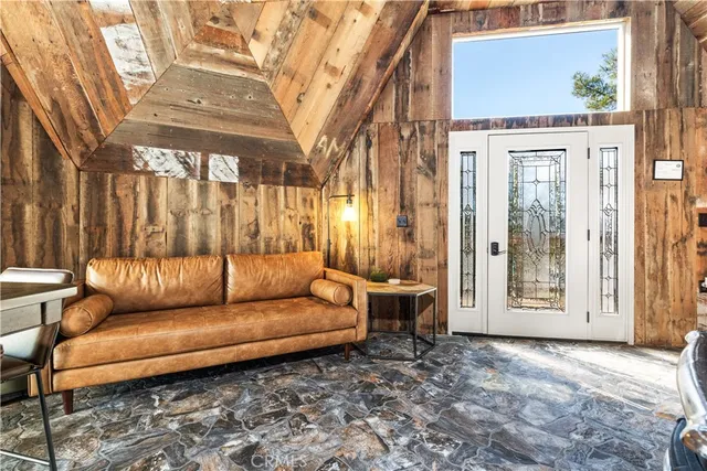a blue bench sitting in front of a building