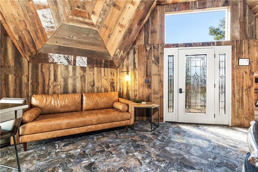 2178 Ridge Rider Road Bradley, CA 93426 - Photo 9 of 51 a blue bench sitting in front of a building