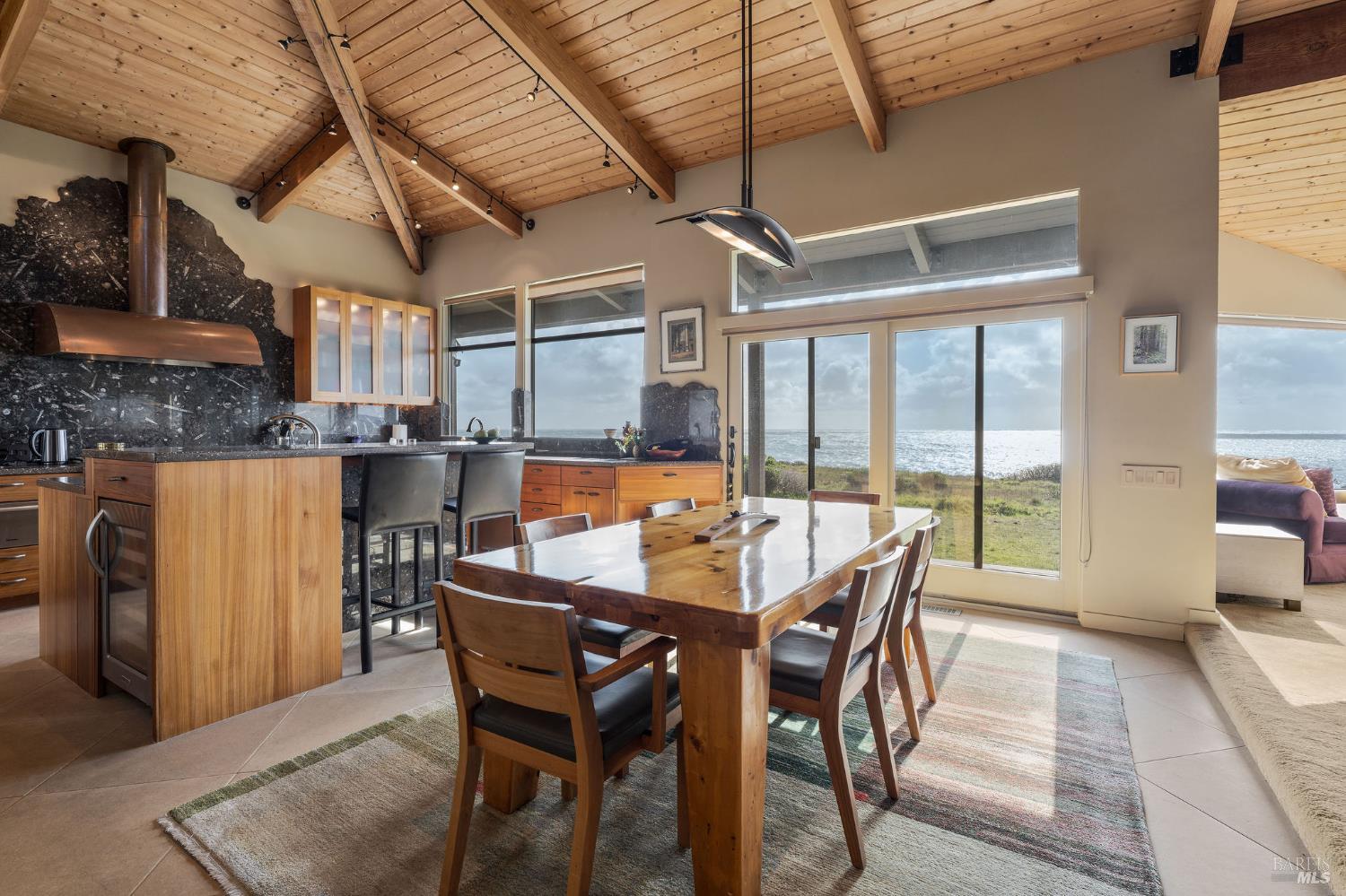 40445 Tide Pool The Sea Ranch, CA 95497 - Photo 12 of 75 a view of a dining room with furniture window and outside view