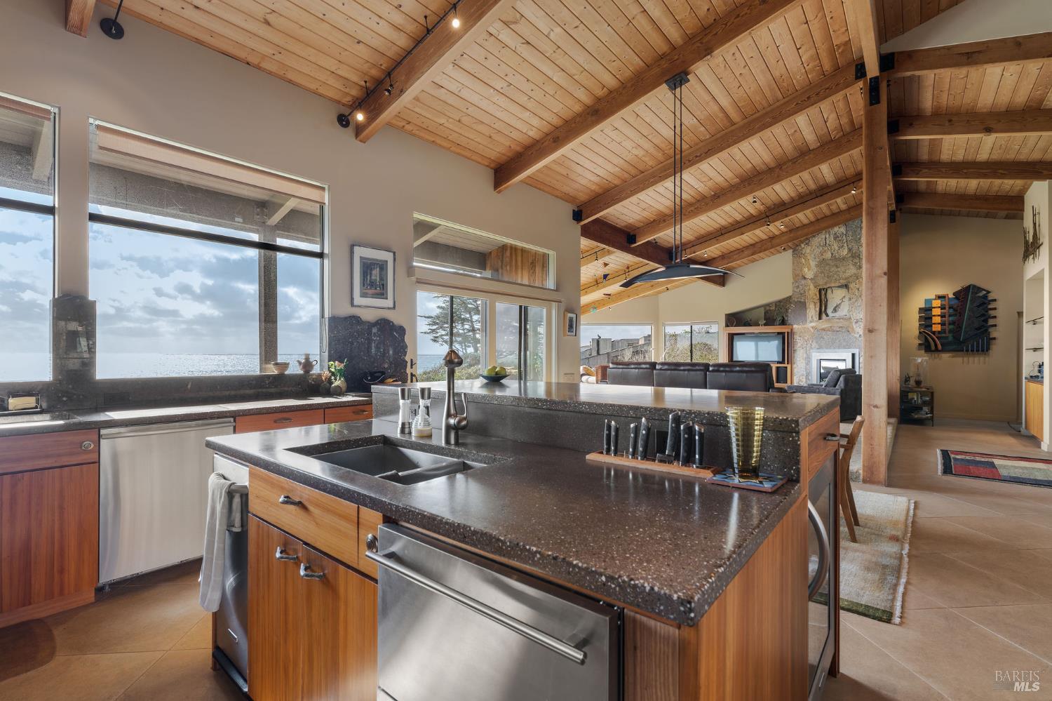 40445 Tide Pool The Sea Ranch, CA 95497 - Photo 17 of 75 a kitchen with stainless steel appliances granite countertop a sink a stove and a counter top space