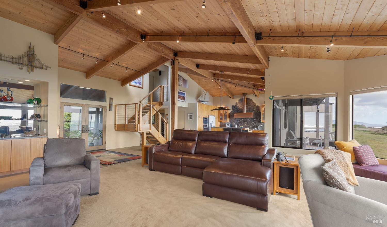 40445 Tide Pool The Sea Ranch, CA 95497 - Photo 21 of 75 a living room with furniture and a fireplace