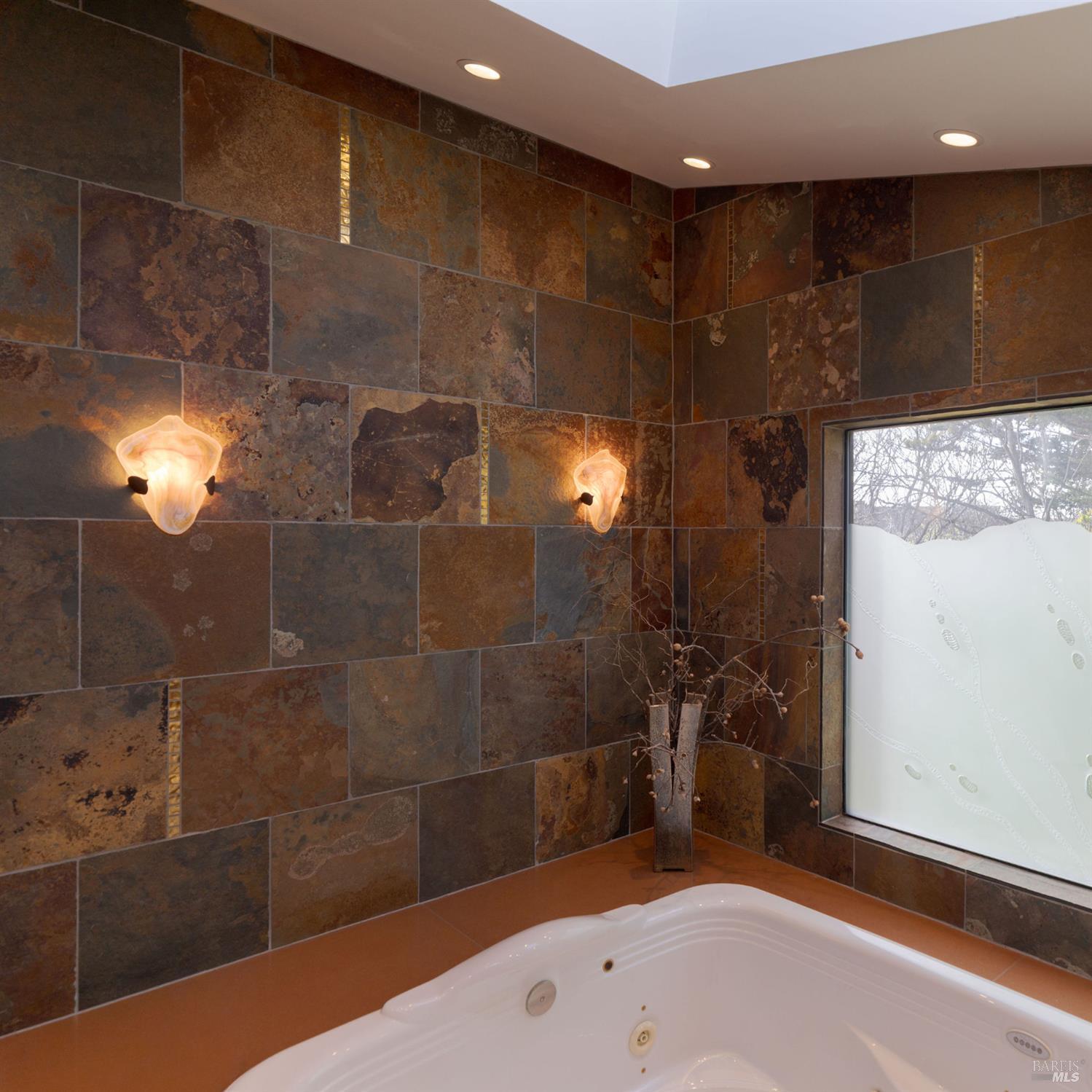 40445 Tide Pool The Sea Ranch, CA 95497 - Photo 33 of 75 a bathroom with a bathtub and a shower