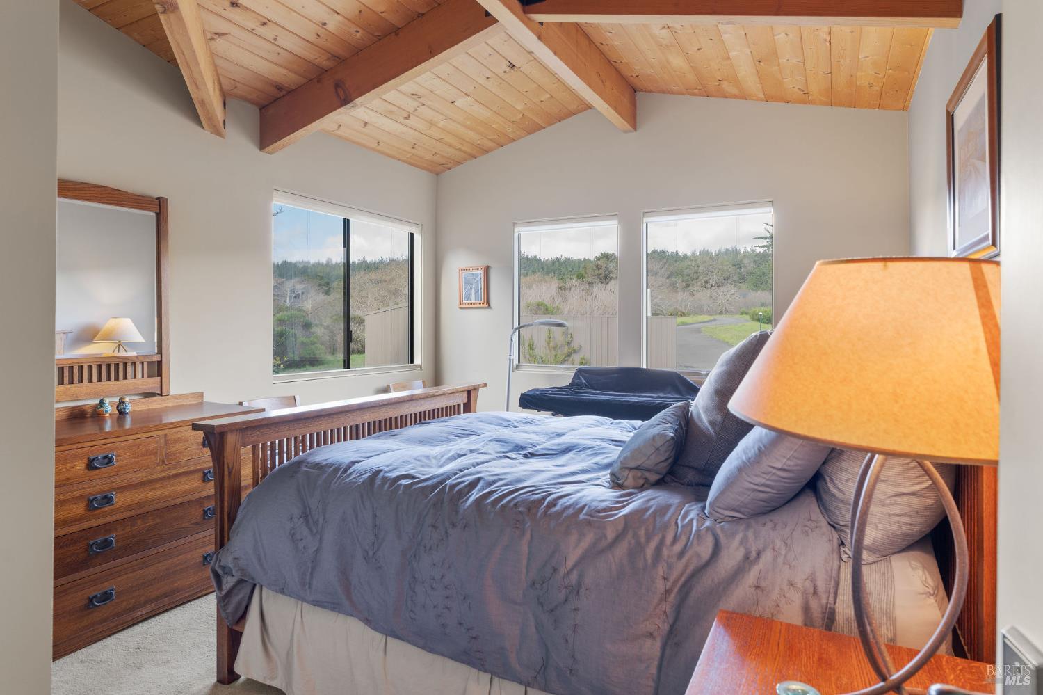 40445 Tide Pool The Sea Ranch, CA 95497 - Photo 38 of 75 a bed sitting in a bedroom next to a window