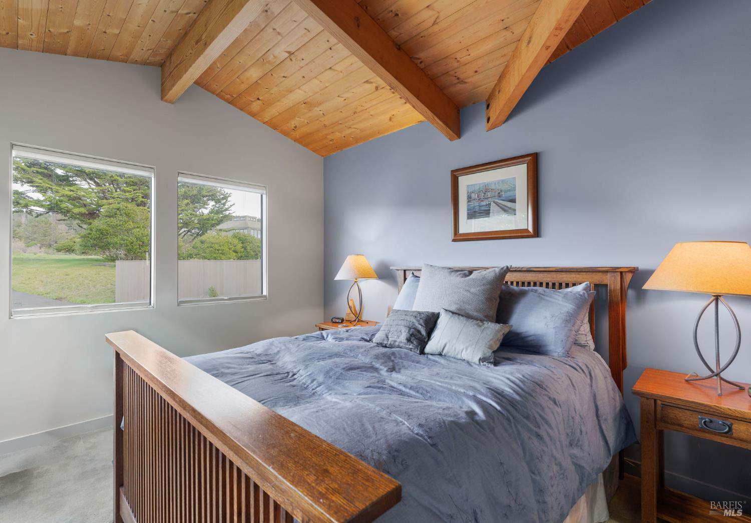 40445 Tide Pool The Sea Ranch, CA 95497 - Photo 40 of 75 a bed sitting in a bedroom next to a window