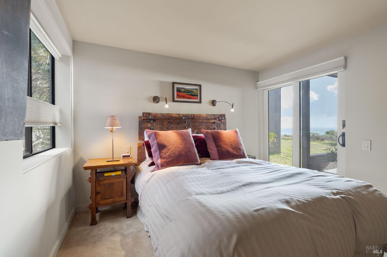 40445 Tide Pool The Sea Ranch, CA 95497 - Photo 46 of 75 a bedroom with a bed and a window