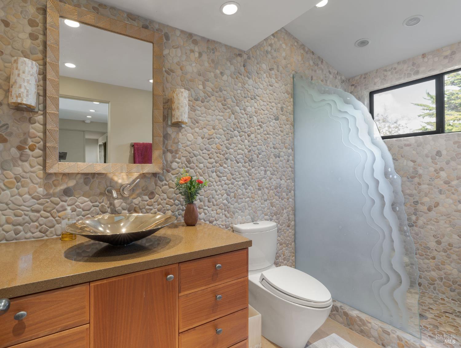 40445 Tide Pool The Sea Ranch, CA 95497 - Photo 48 of 75 a bathroom with a granite countertop sink toilet and mirror