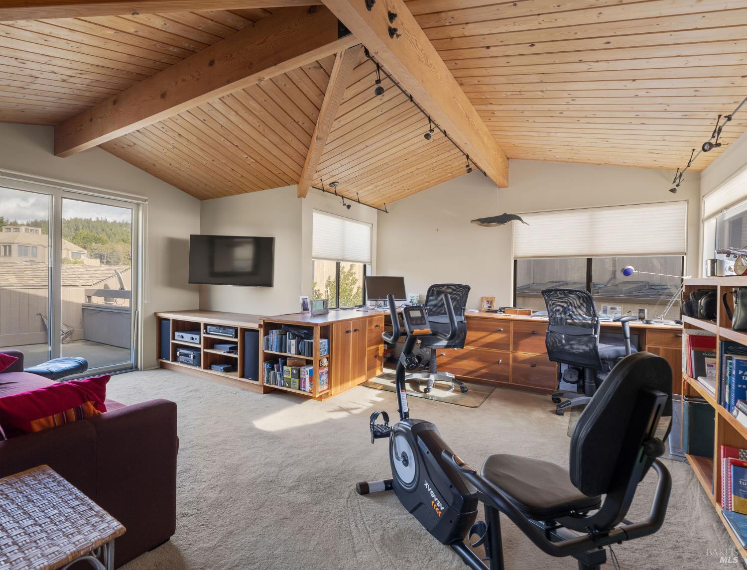 40445 Tide Pool The Sea Ranch, CA 95497 - Photo 50 of 75 a living room with furniture kitchen view and a flat screen tv
