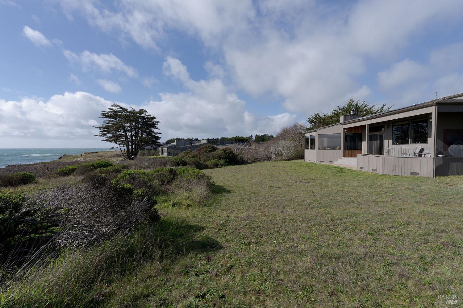 40445 Tide Pool The Sea Ranch, CA 95497 - Photo 62 of 75 a view of a house with a backyard