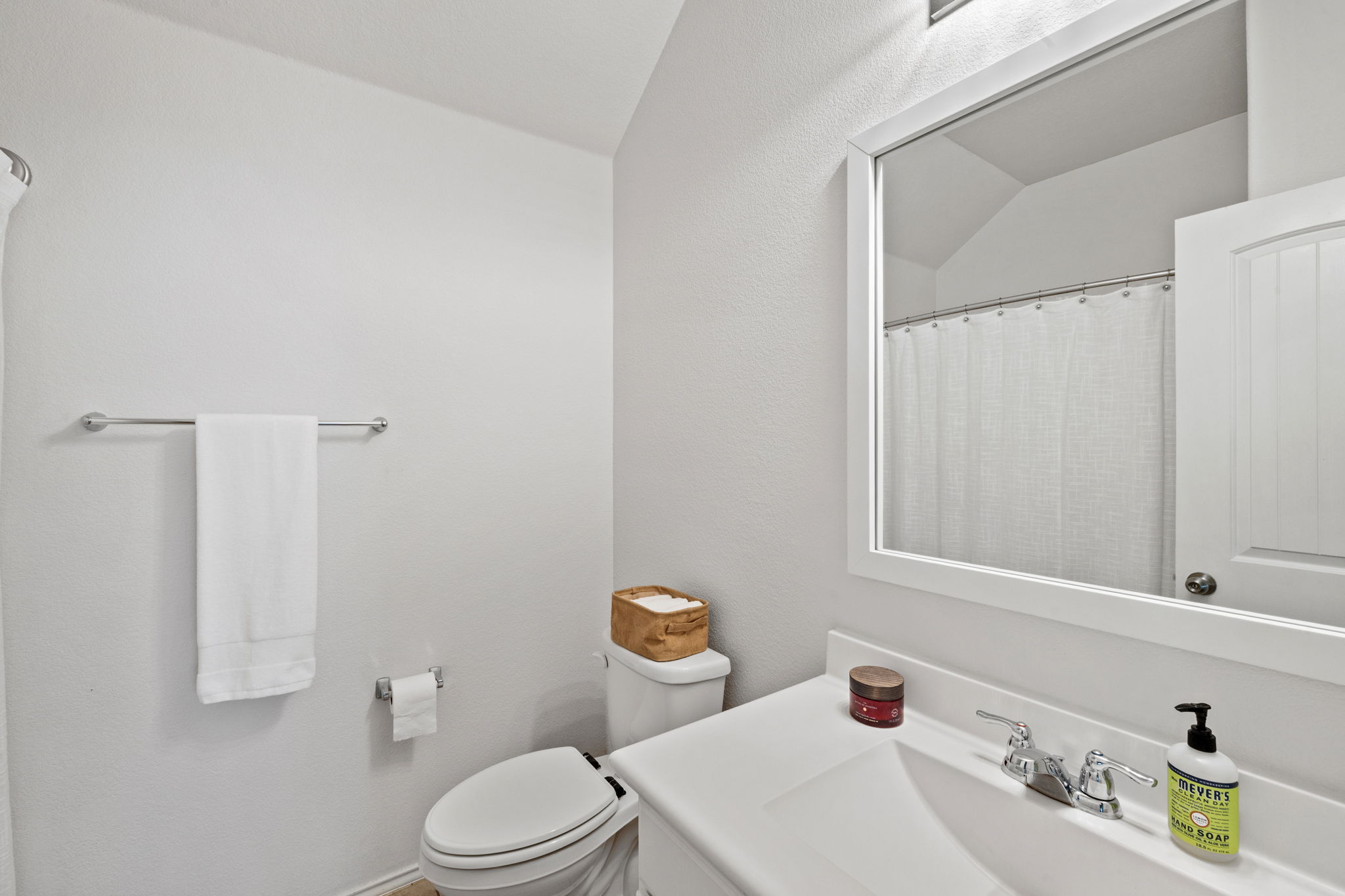 482 Travertine Trail Buda, TX 78610 - Photo 12 of 40 a bathroom with a sink and a toilet