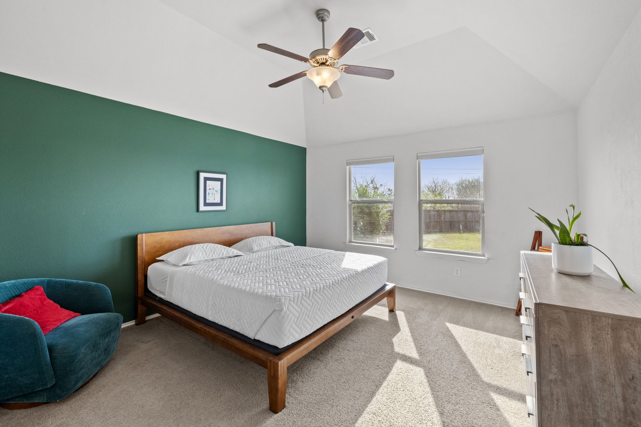 482 Travertine Trail Buda, TX 78610 - Photo 18 of 40 a bedroom with bed and a window