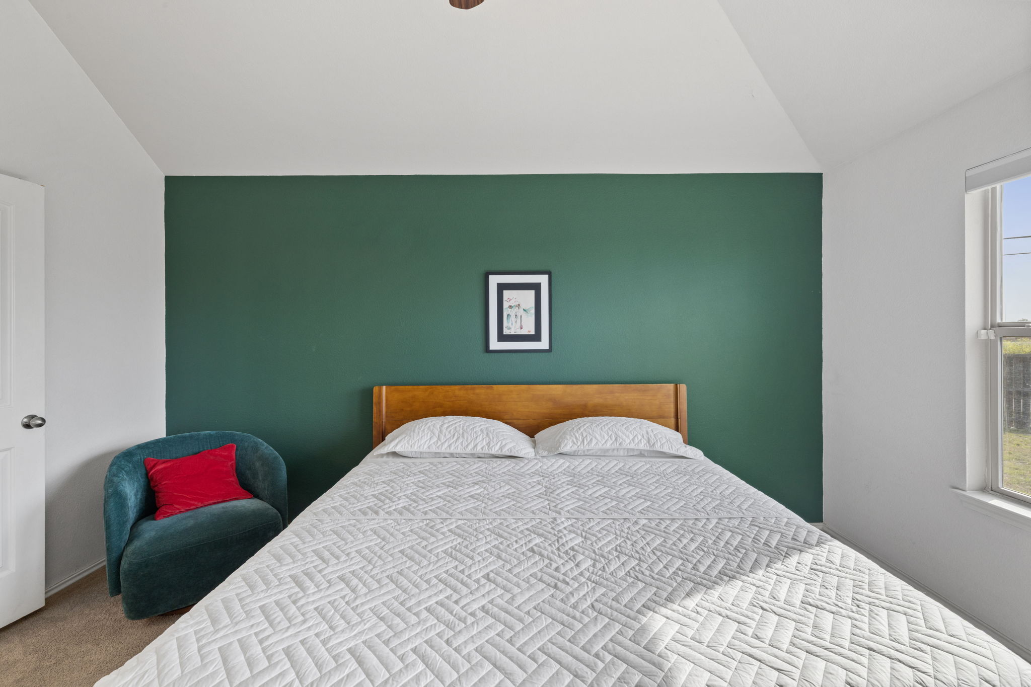 482 Travertine Trail Buda, TX 78610 - Photo 20 of 40 a bedroom with a bed and a couch