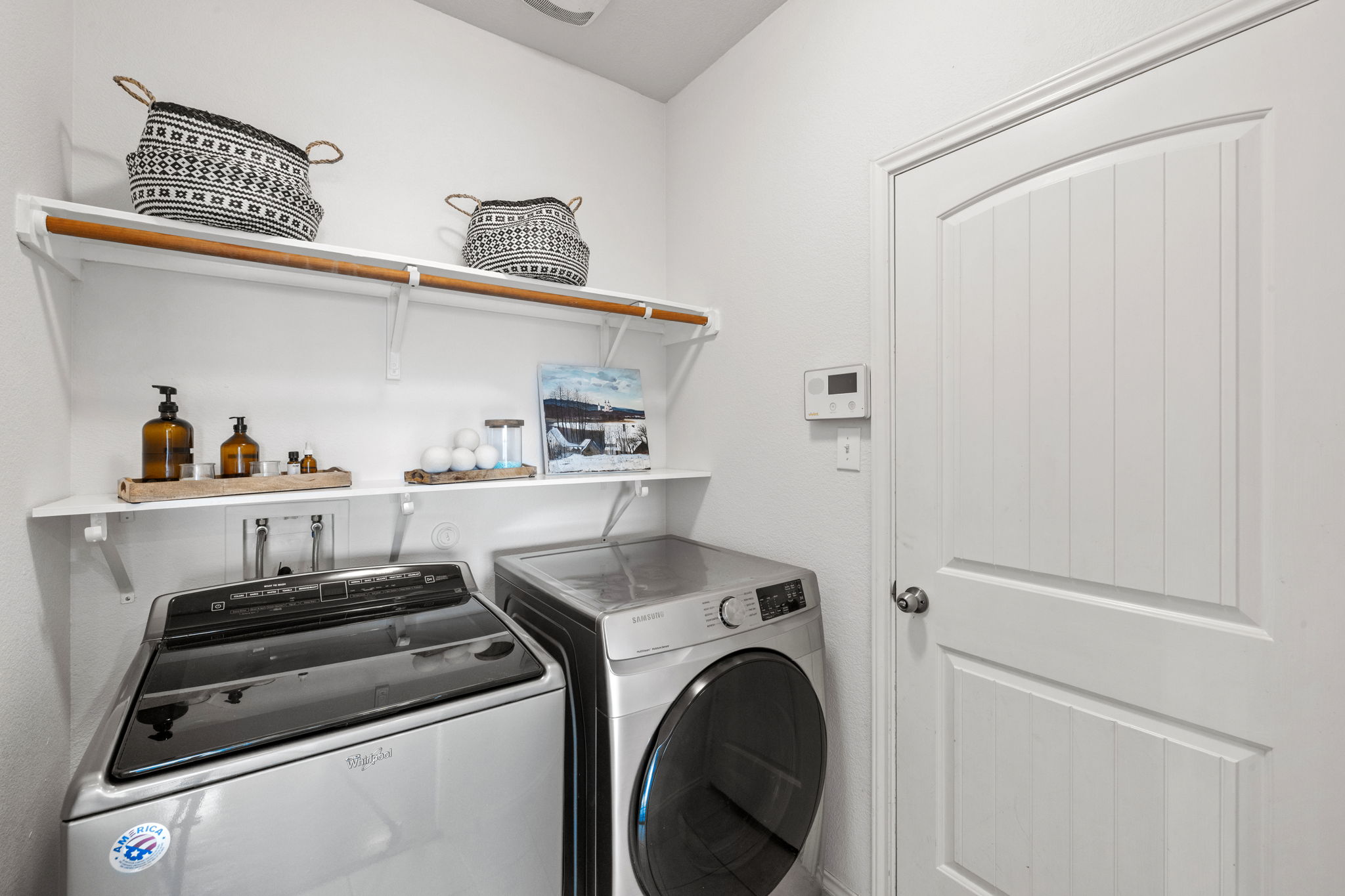 482 Travertine Trail Buda, TX 78610 - Photo 26 of 40 a utility room with dryer and washer