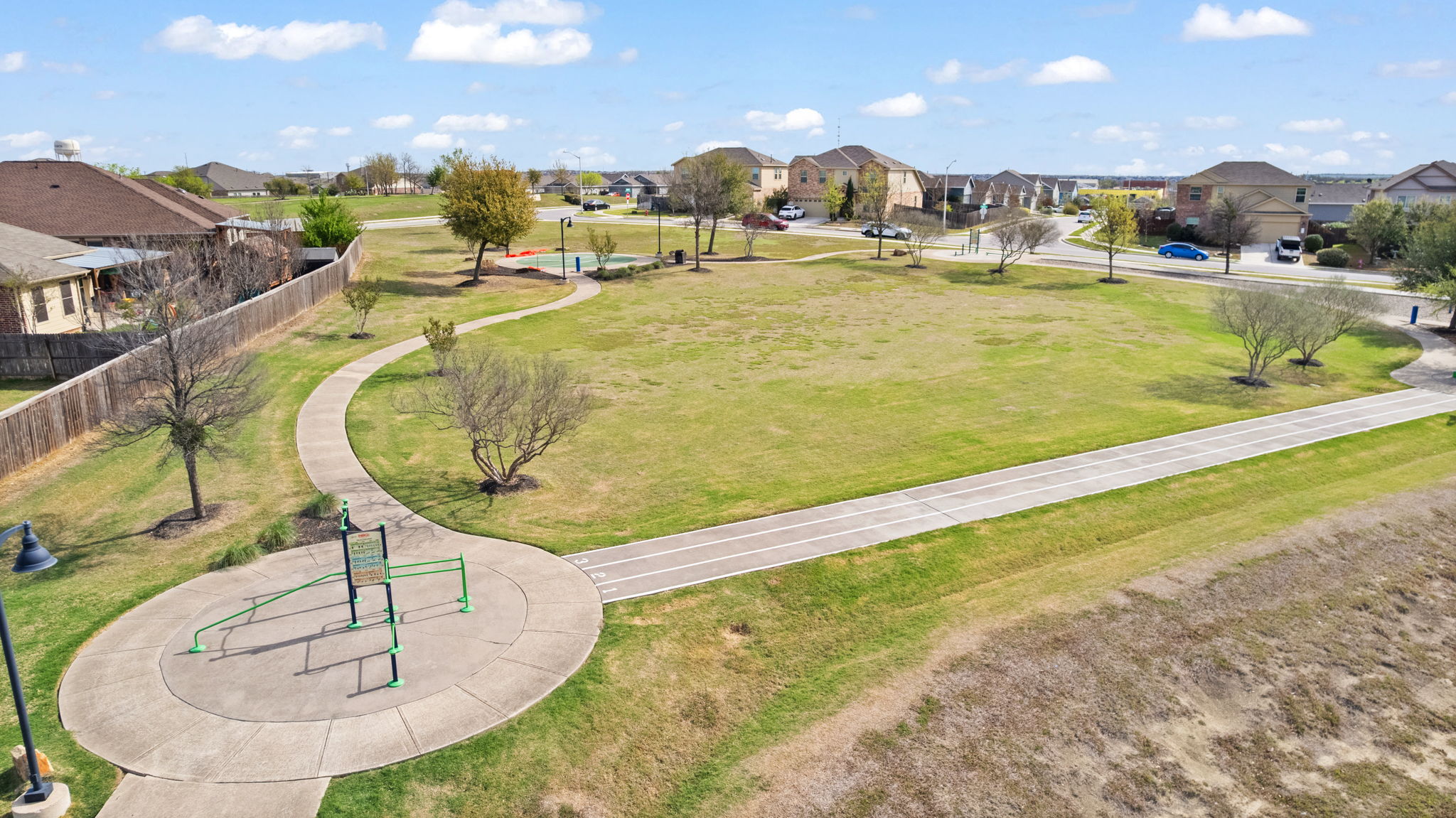 482 Travertine Trail Buda, TX 78610 - Photo 34 of 40 a view of a swimming pool with a patio