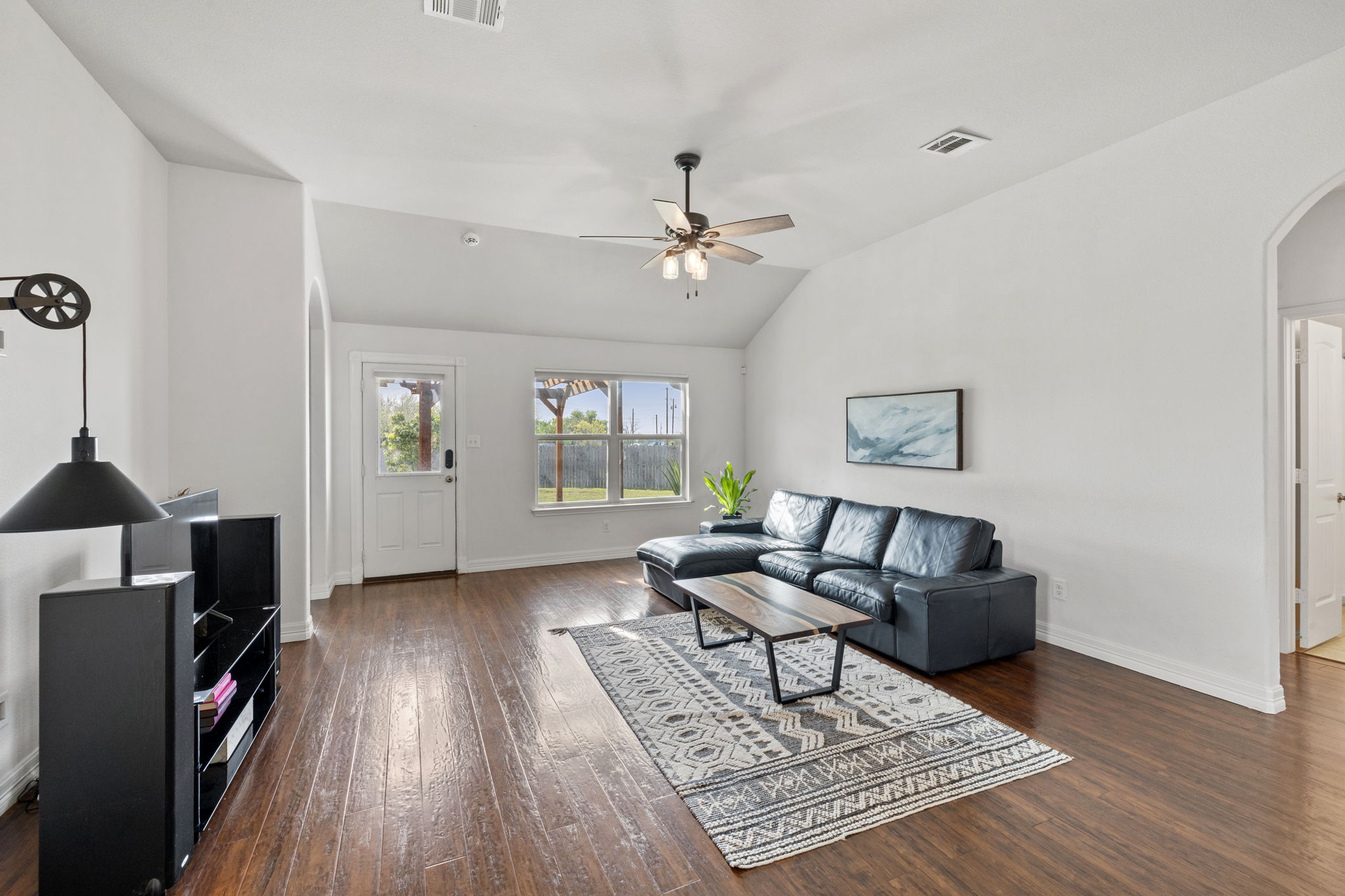 482 Travertine Trail Buda, TX 78610 - Photo 7 of 40 a living room with furniture and wooden floor