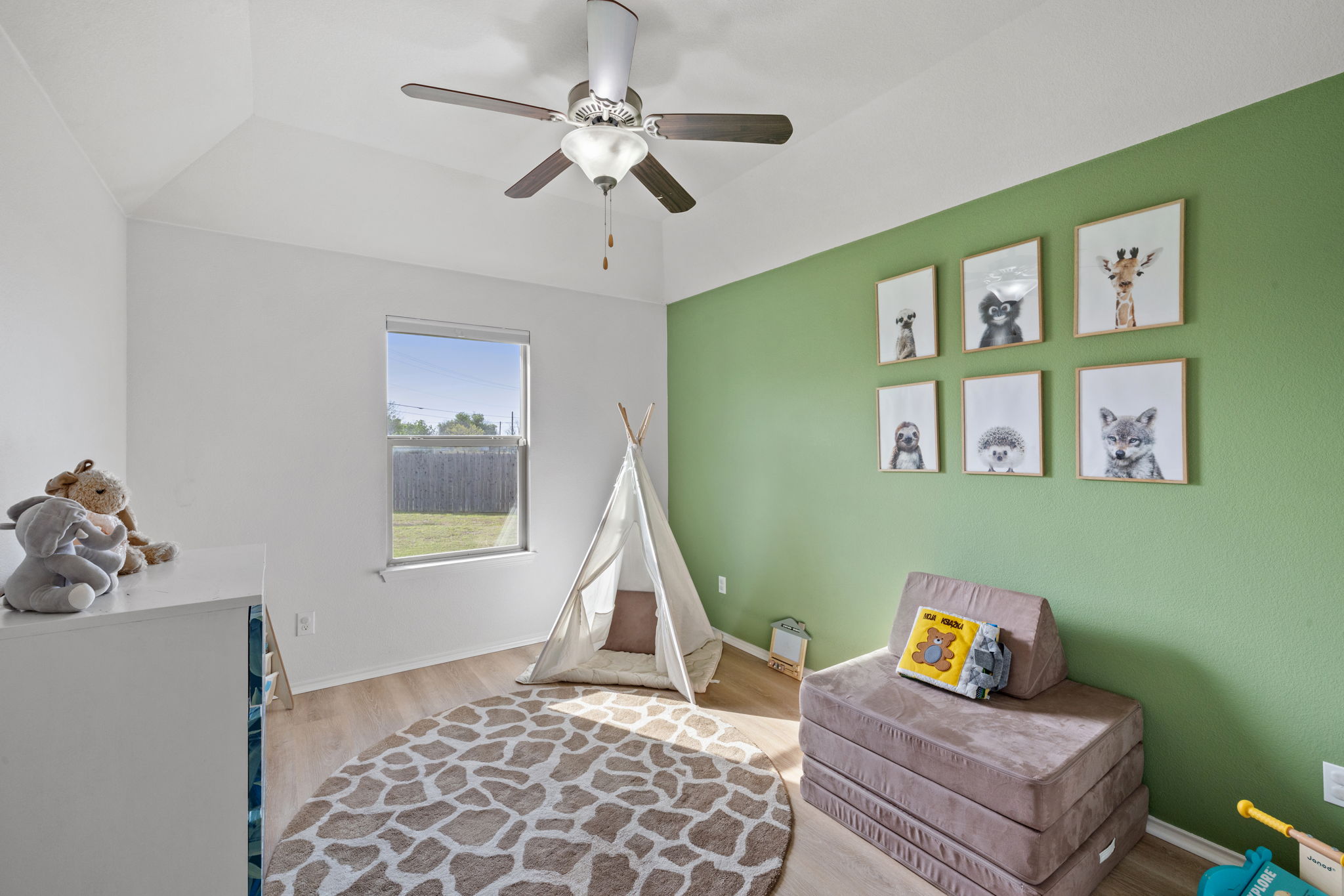482 Travertine Trail Buda, TX 78610 - Photo 10 of 40 a living room with furniture and a window