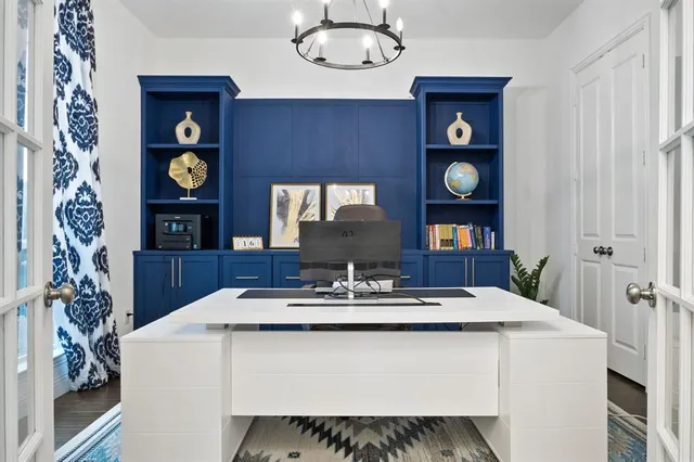 a dining table with chairs and wooden floor
