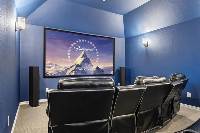a room with chairs and projector