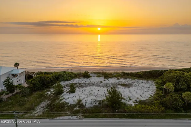 a view of beach and ocean