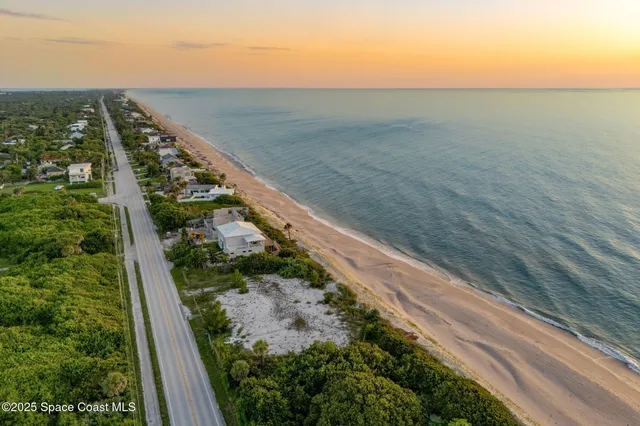 a view of an ocean beach and outdoor space