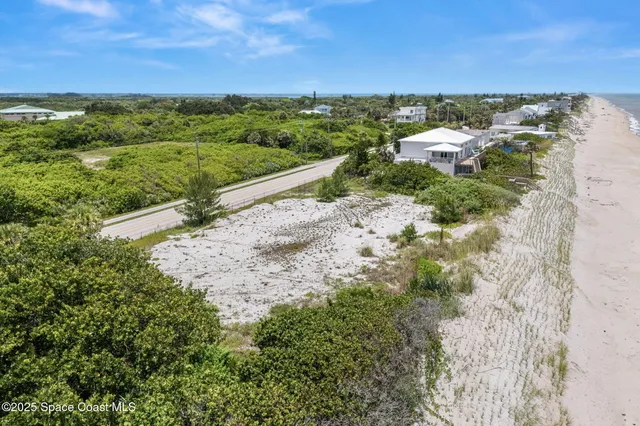 a view of a road with an ocean view