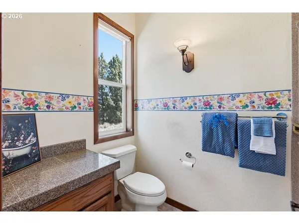 a view of a kitchen with a sink