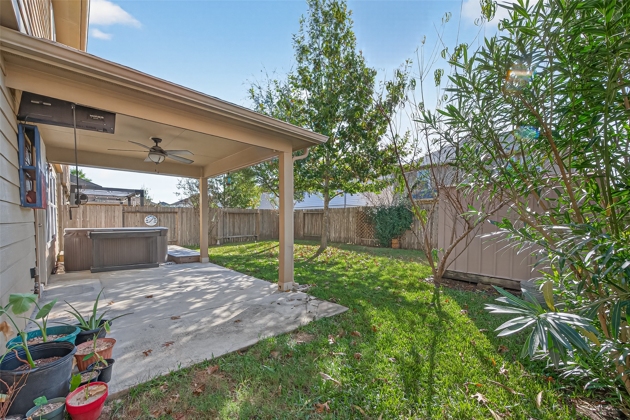 9940 Swallow Drive Conroe, TX 77385 - Photo 23 of 30 Extended concrete patio beyond covered area