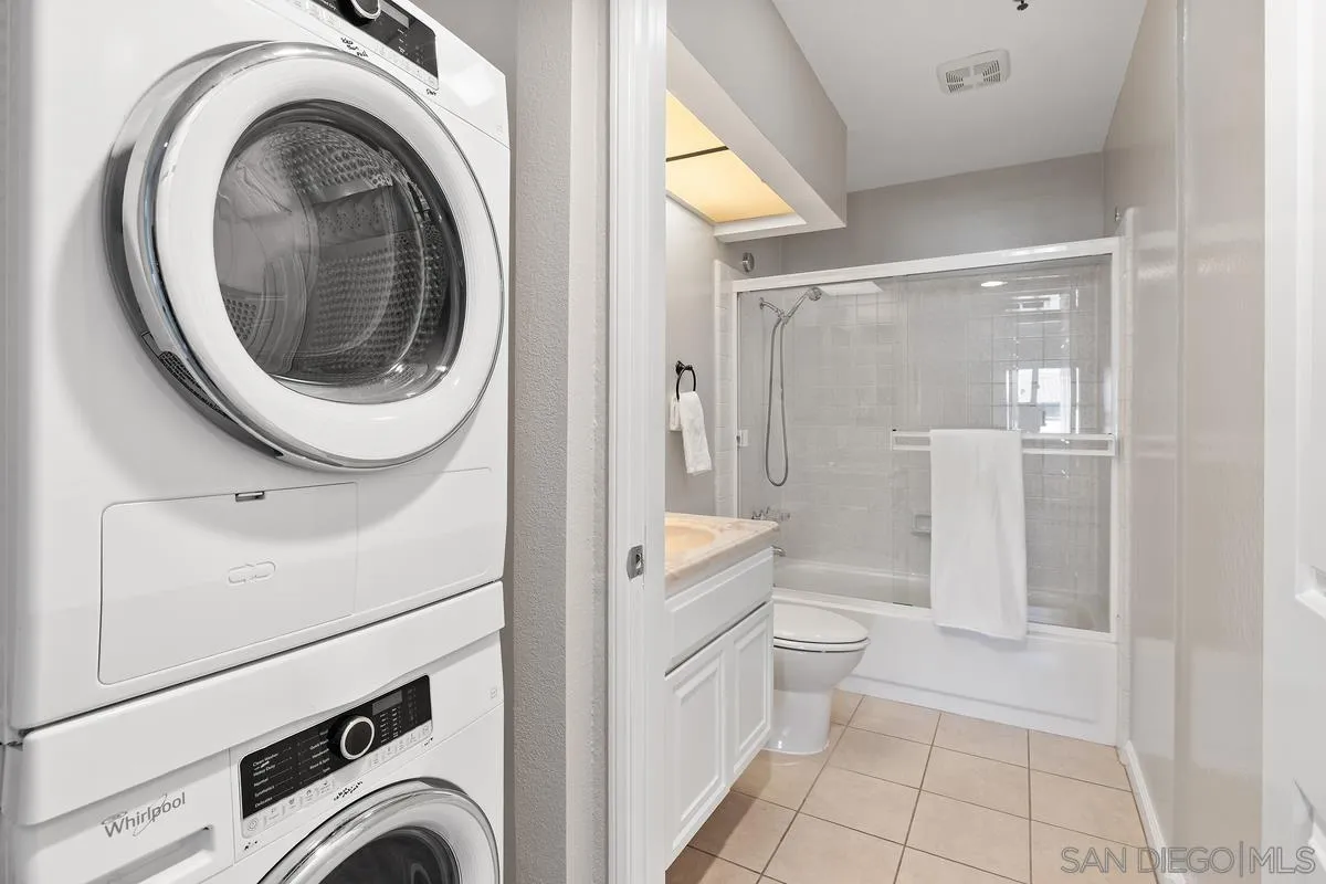 5705 Friars Road, Unit 60 San Diego, CA 92110 - Photo 23 of 49 a view of a bathroom with a washer and dryer