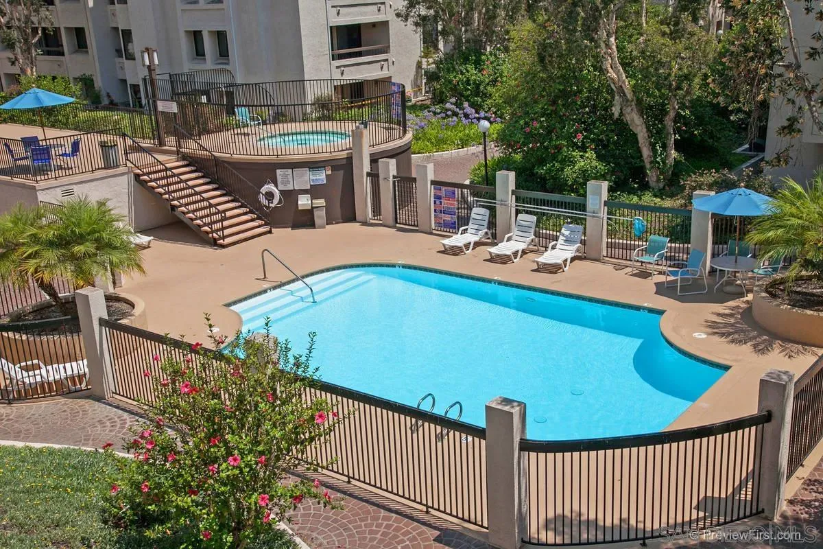 5705 Friars Road, Unit 60 San Diego, CA 92110 - Photo 29 of 49 a view of a patio with swimming pool