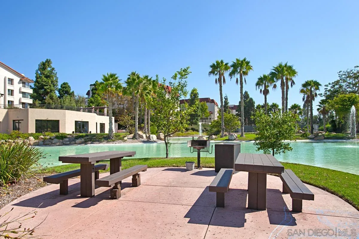5705 Friars Road, Unit 60 San Diego, CA 92110 - Photo 38 of 49 a view of house with a yard and sitting area