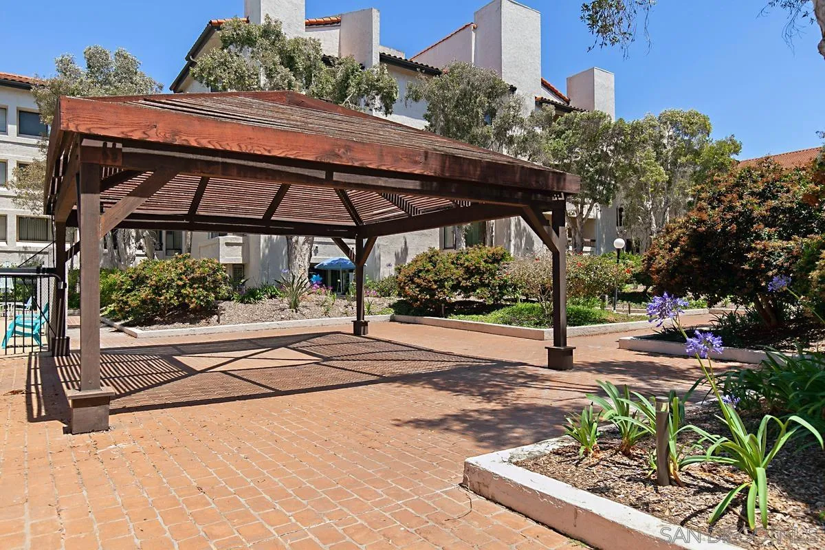 5705 Friars Road, Unit 60 San Diego, CA 92110 - Photo 42 of 49 a view of a street with potted plants