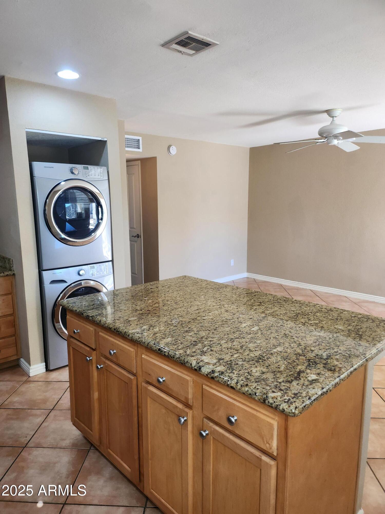 12440 North 20th Street, Unit 102 Phoenix, AZ 85022 - Photo 2 of 13 a bedroom with a bed and a sink