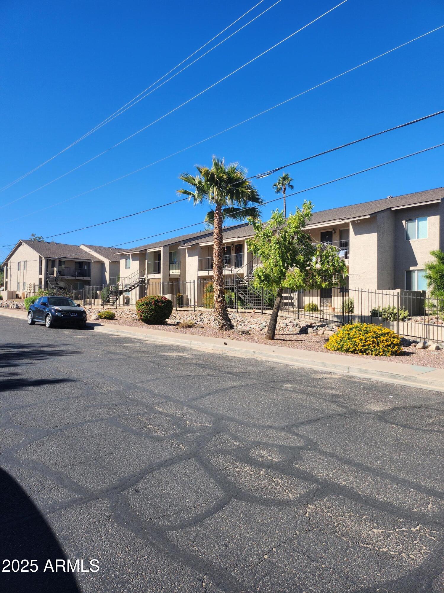 12440 North 20th Street, Unit 102 Phoenix, AZ 85022 - Photo 6 of 13 a view of street with cars