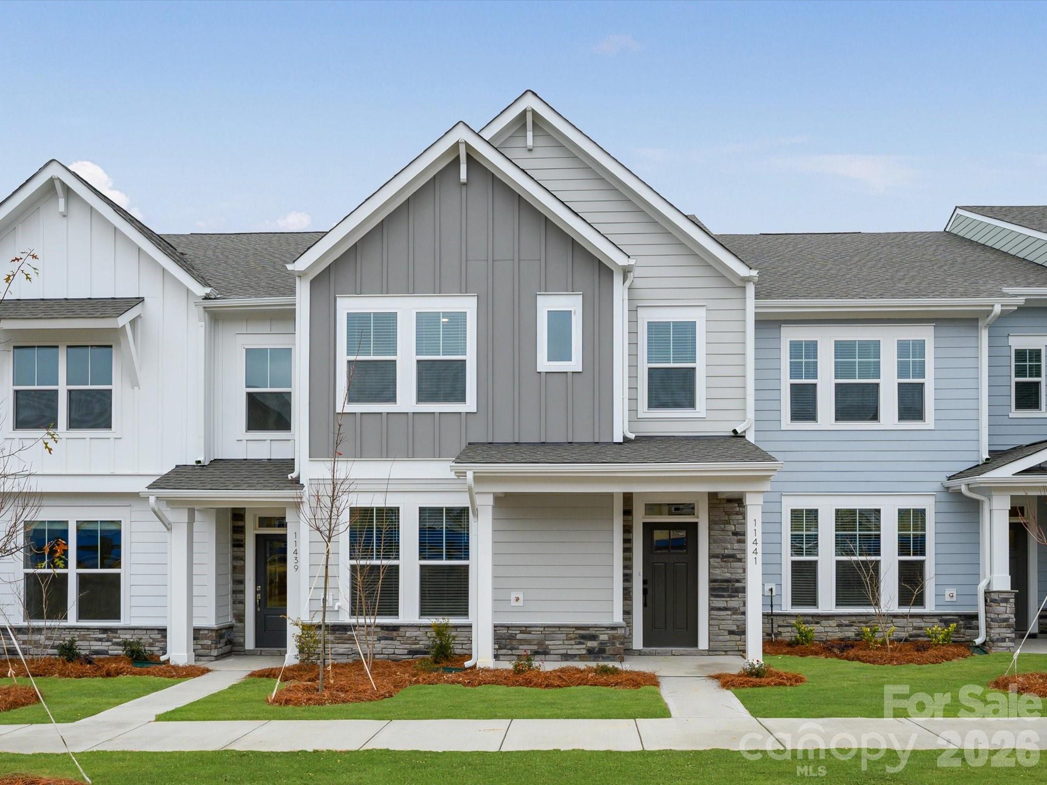 11441 Prosperity Church Road Huntersville, NC 28078 - Photo 1 of 32 a front view of a house with a yard