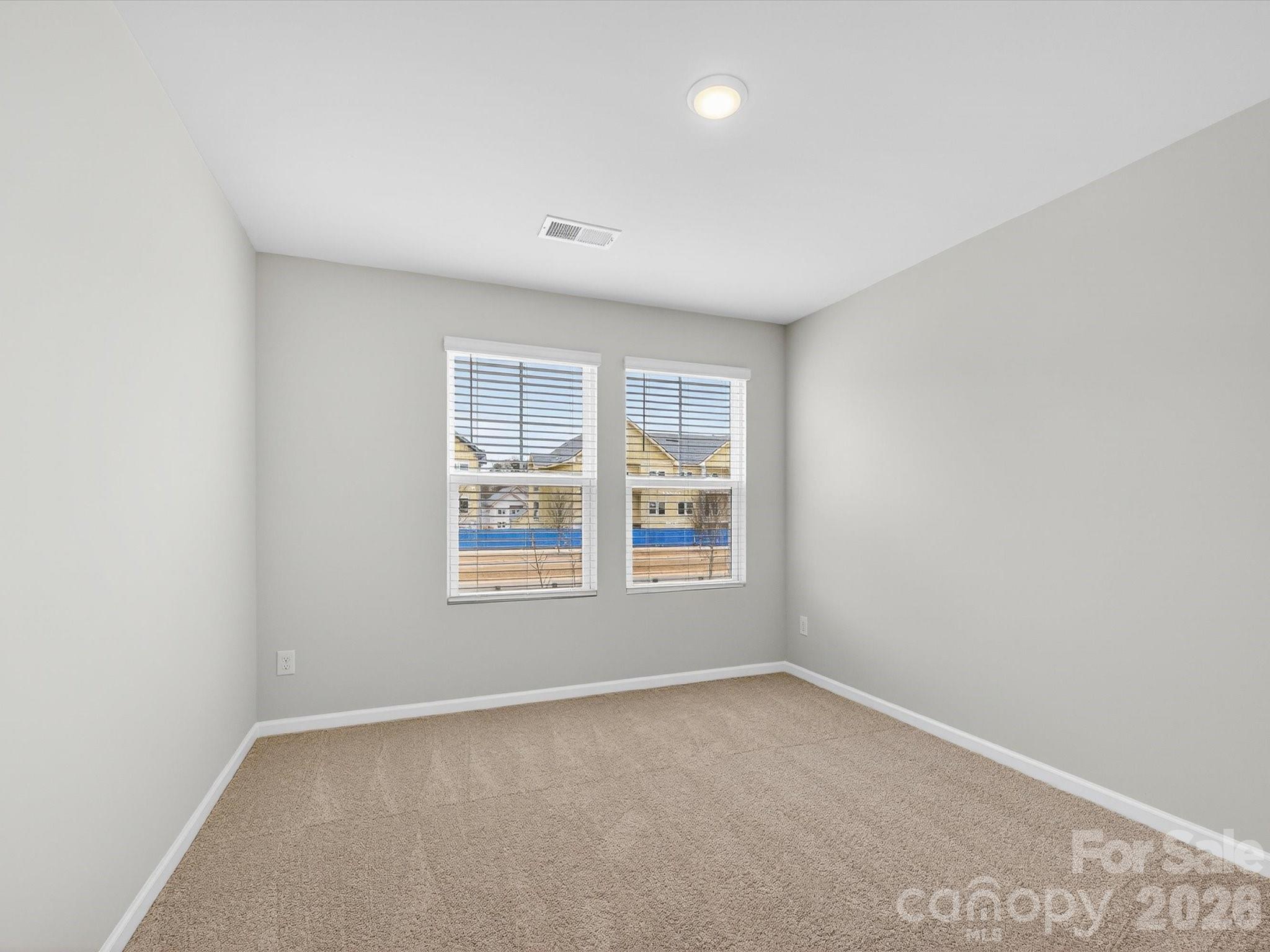 11441 Prosperity Church Road Huntersville, NC 28078 - Photo 22 of 32 an empty room with a window