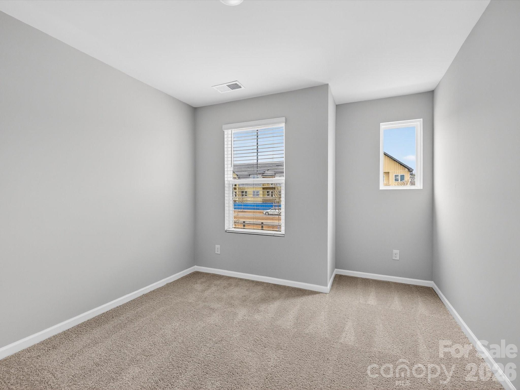 11441 Prosperity Church Road Huntersville, NC 28078 - Photo 23 of 32 an empty room with windows