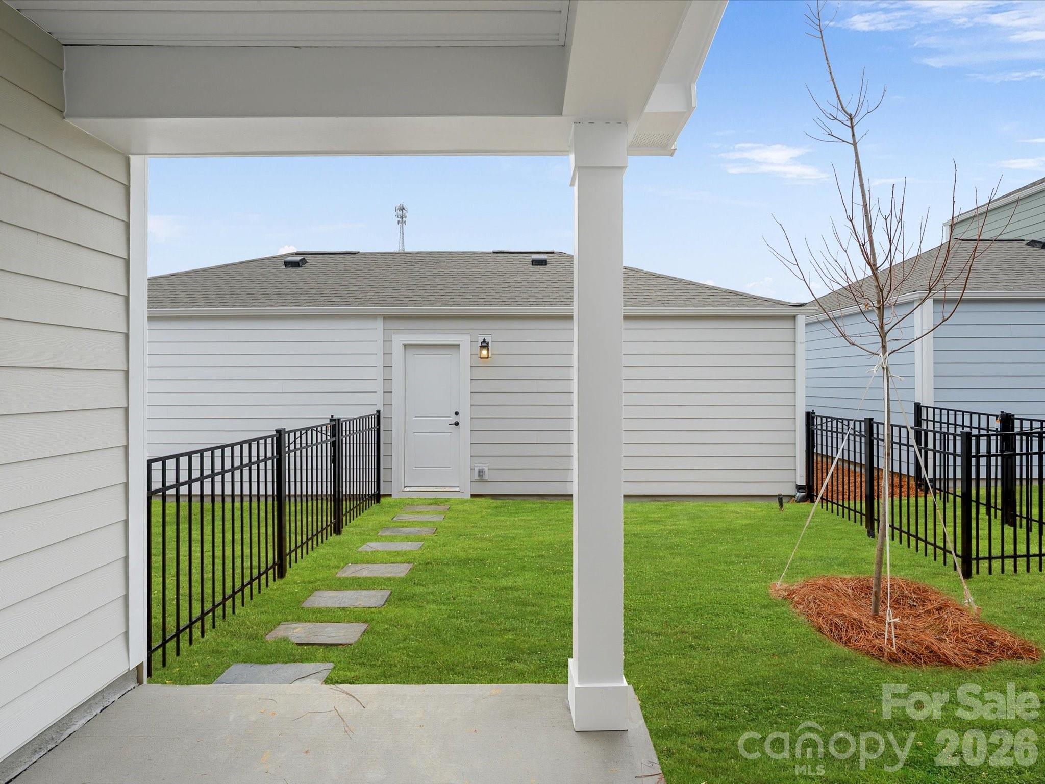 11441 Prosperity Church Road Huntersville, NC 28078 - Photo 26 of 32 a view of a backyard with a garden