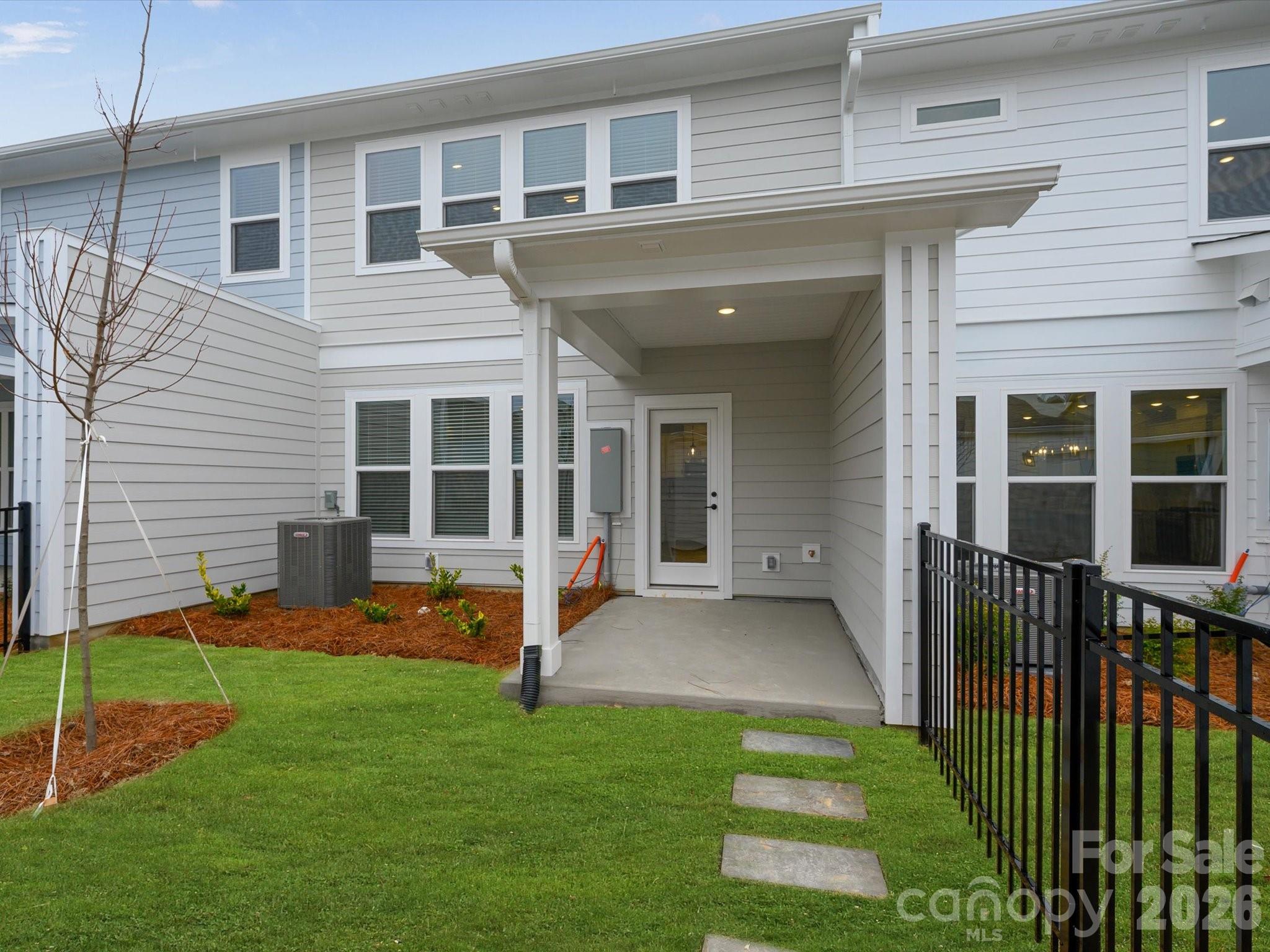 11441 Prosperity Church Road Huntersville, NC 28078 - Photo 27 of 32 a view of a house with backyard and porch
