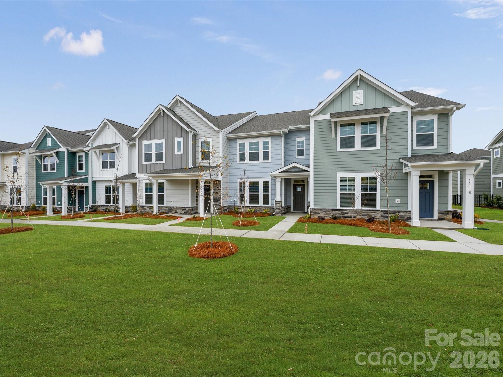 11441 Prosperity Church Road Huntersville, NC 28078 - Photo 30 of 32 a front view of a house with swimming pool having outdoor seating