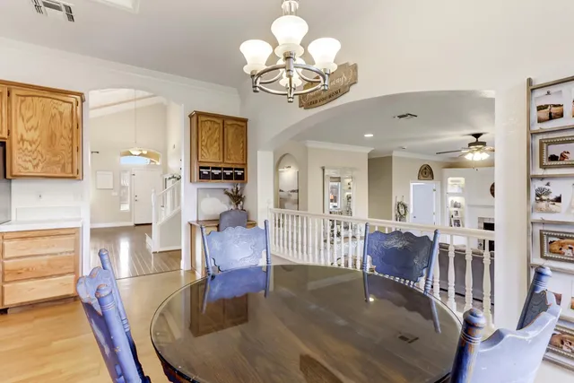 a bedroom with a bed and a table