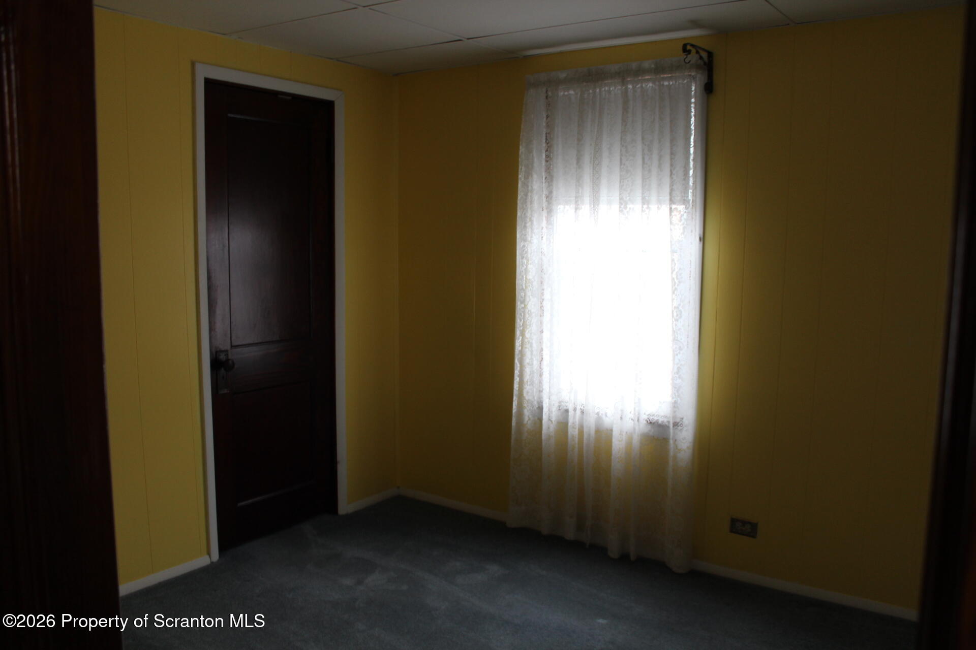 900 Wheeler Avenue Scranton, PA 18510 - Photo 14 of 25 a view of an empty room with a window