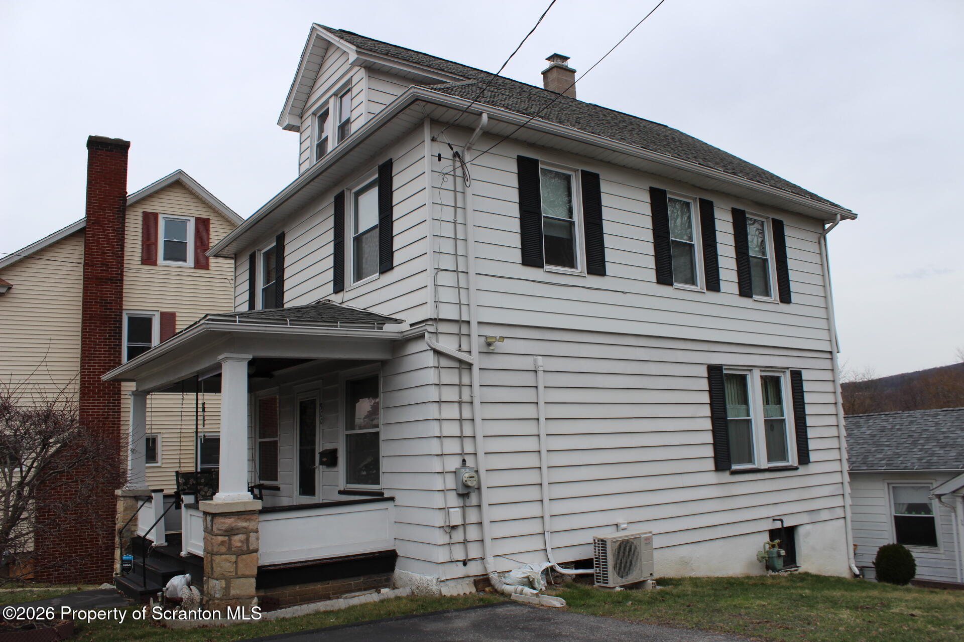 900 Wheeler Avenue Scranton, PA 18510 - Photo 2 of 25 a front view of a house with a yard