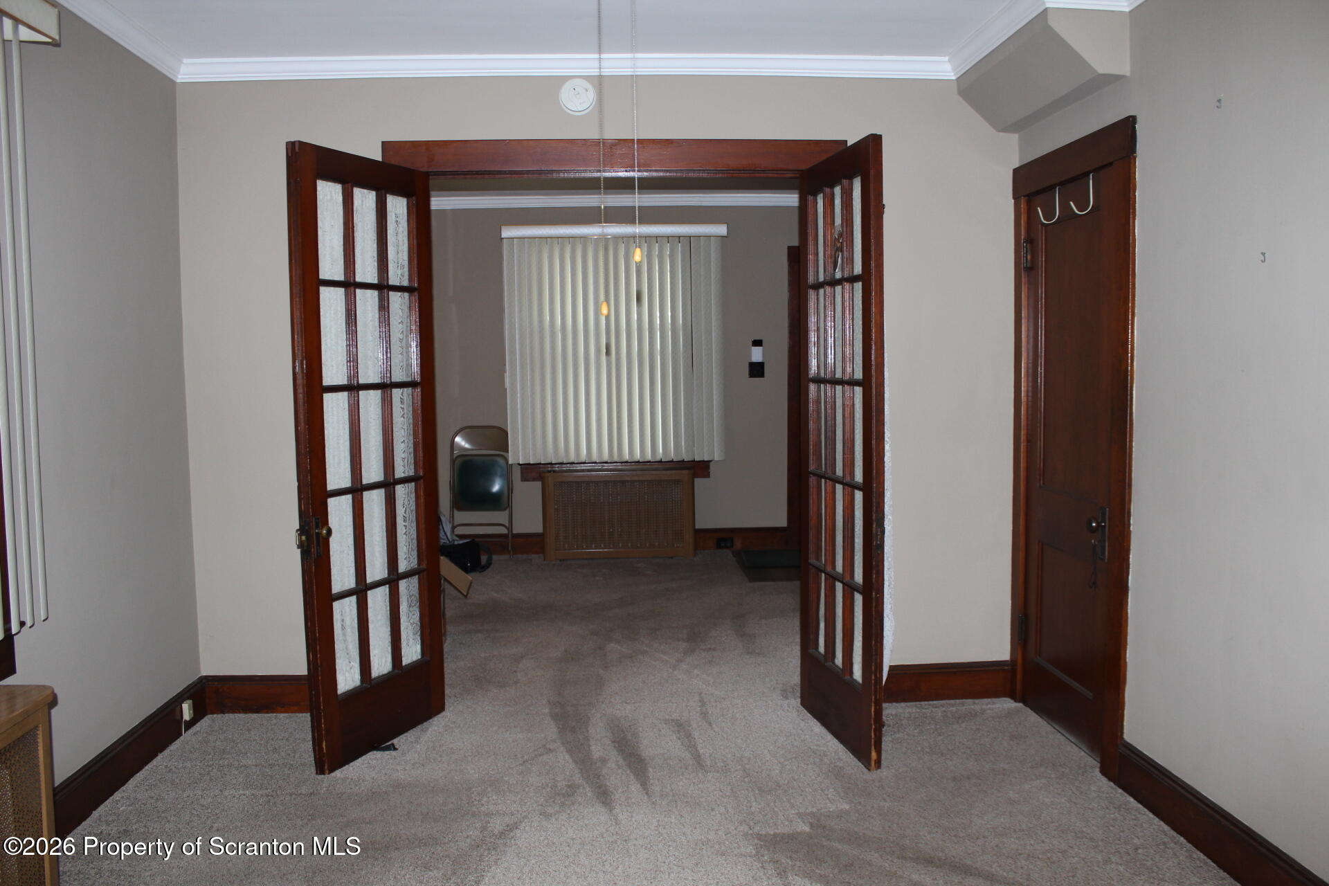 900 Wheeler Avenue Scranton, PA 18510 - Photo 8 of 25 a view of livingroom with hallway