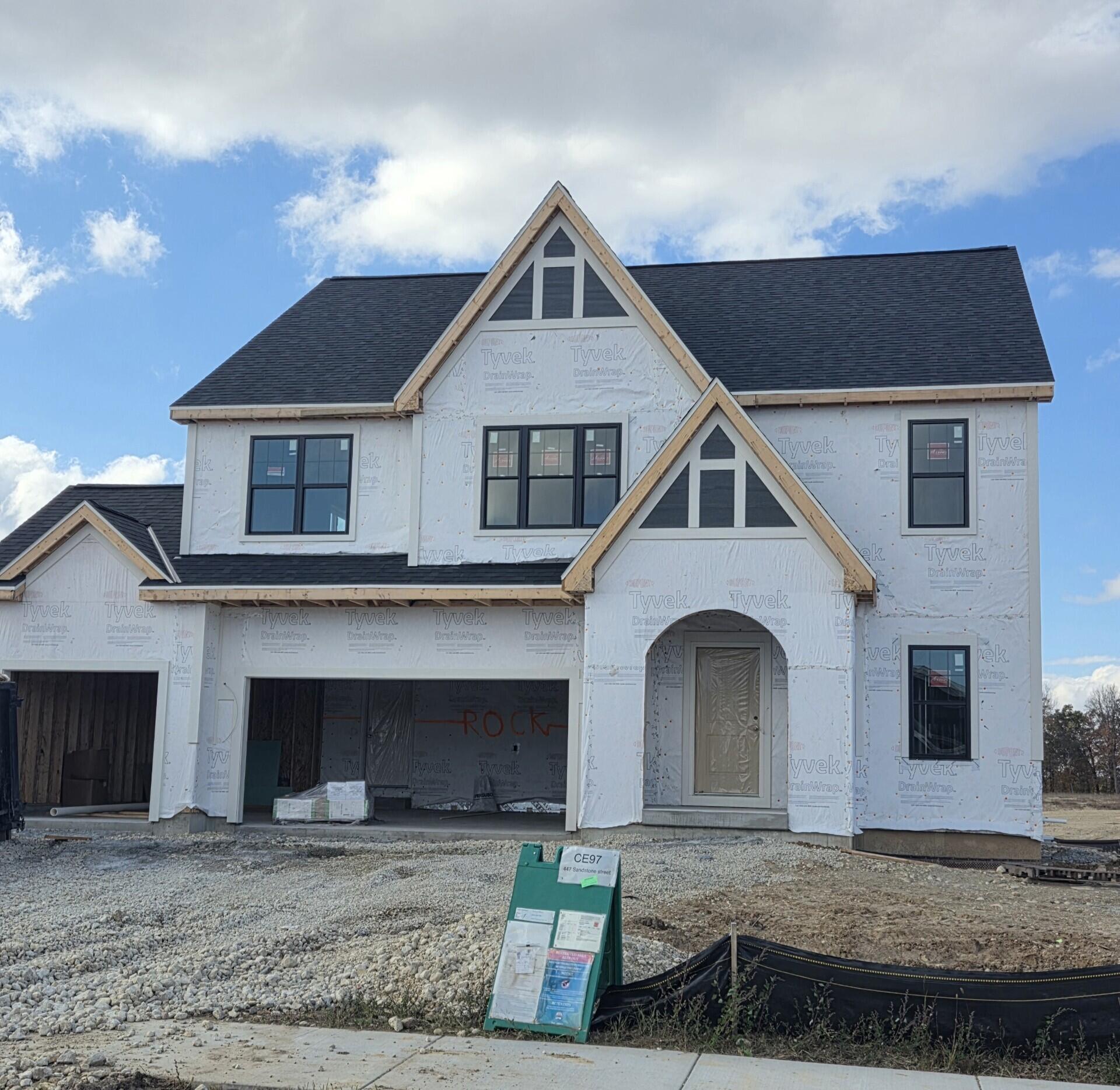 447 Sandstone Street Slinger, WI 53086 - Photo 2 of 8 Siding & Stone Coming Soon!