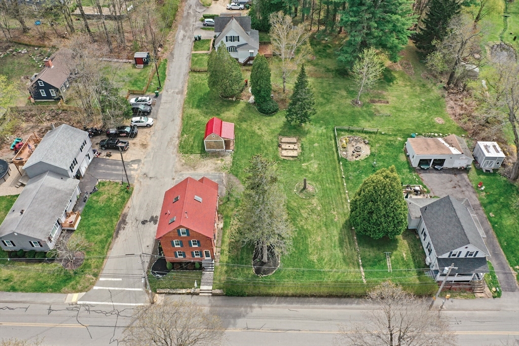 44 Clark Street Spencer, MA 01562 - Photo 32 of 41 an aerial view of multiple houses with yard